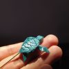 prendedor de tortuga en origami