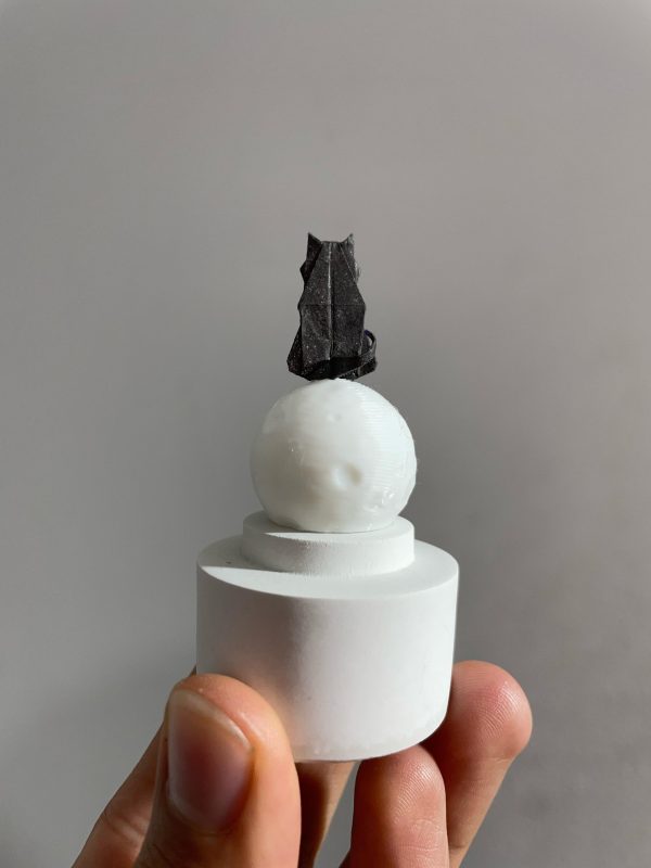 gato de origami obre la luna